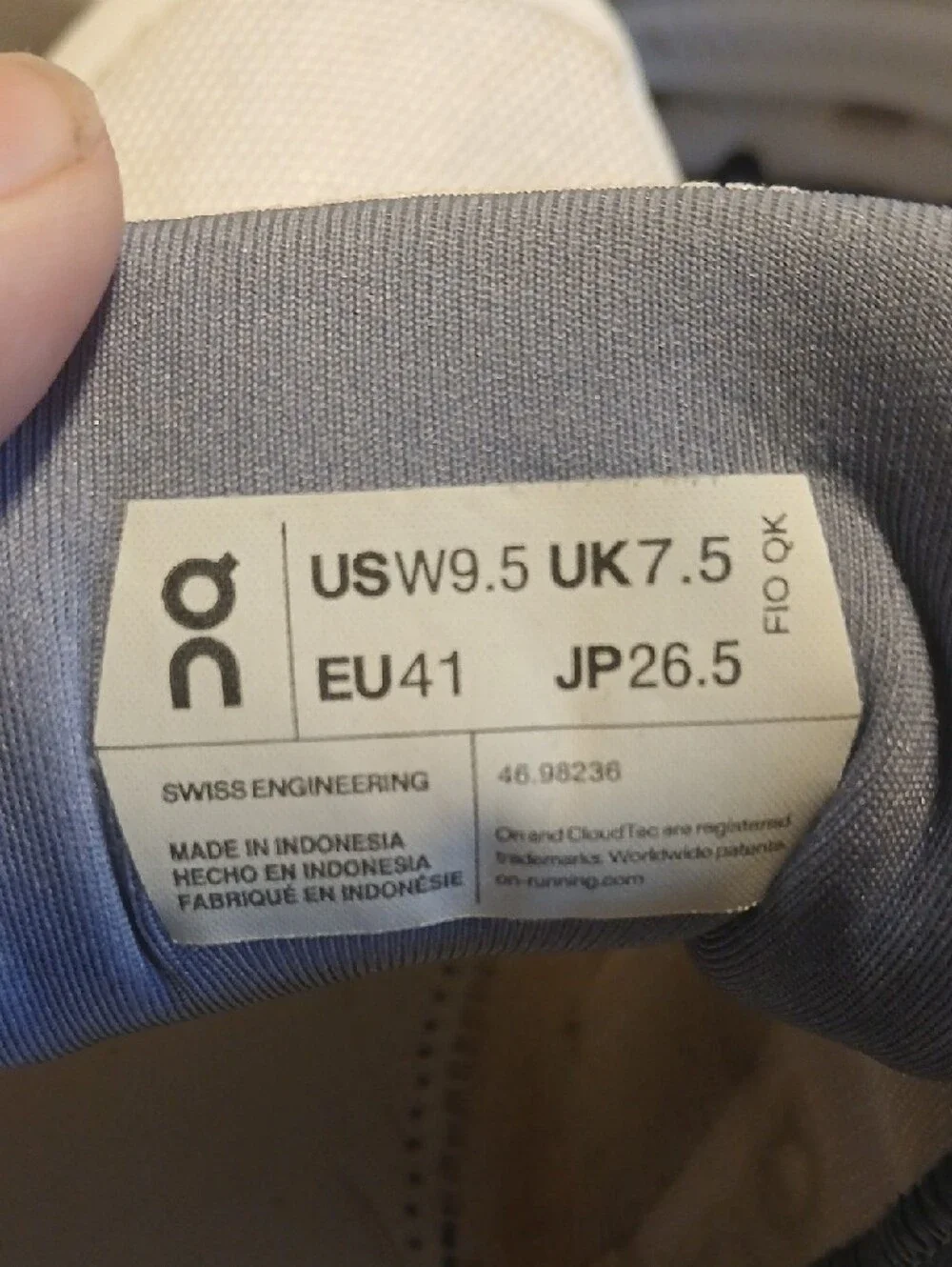 On Running Women's White Athletic Sneakers with Lavender and Peach Accents